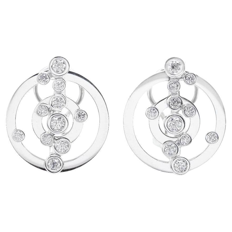 Boucles d'oreilles ADAGIO en or blanc et diamants.