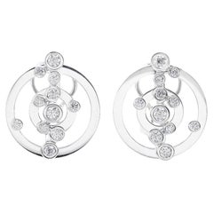 Boucles d'oreilles ADAGIO en or blanc et diamants.