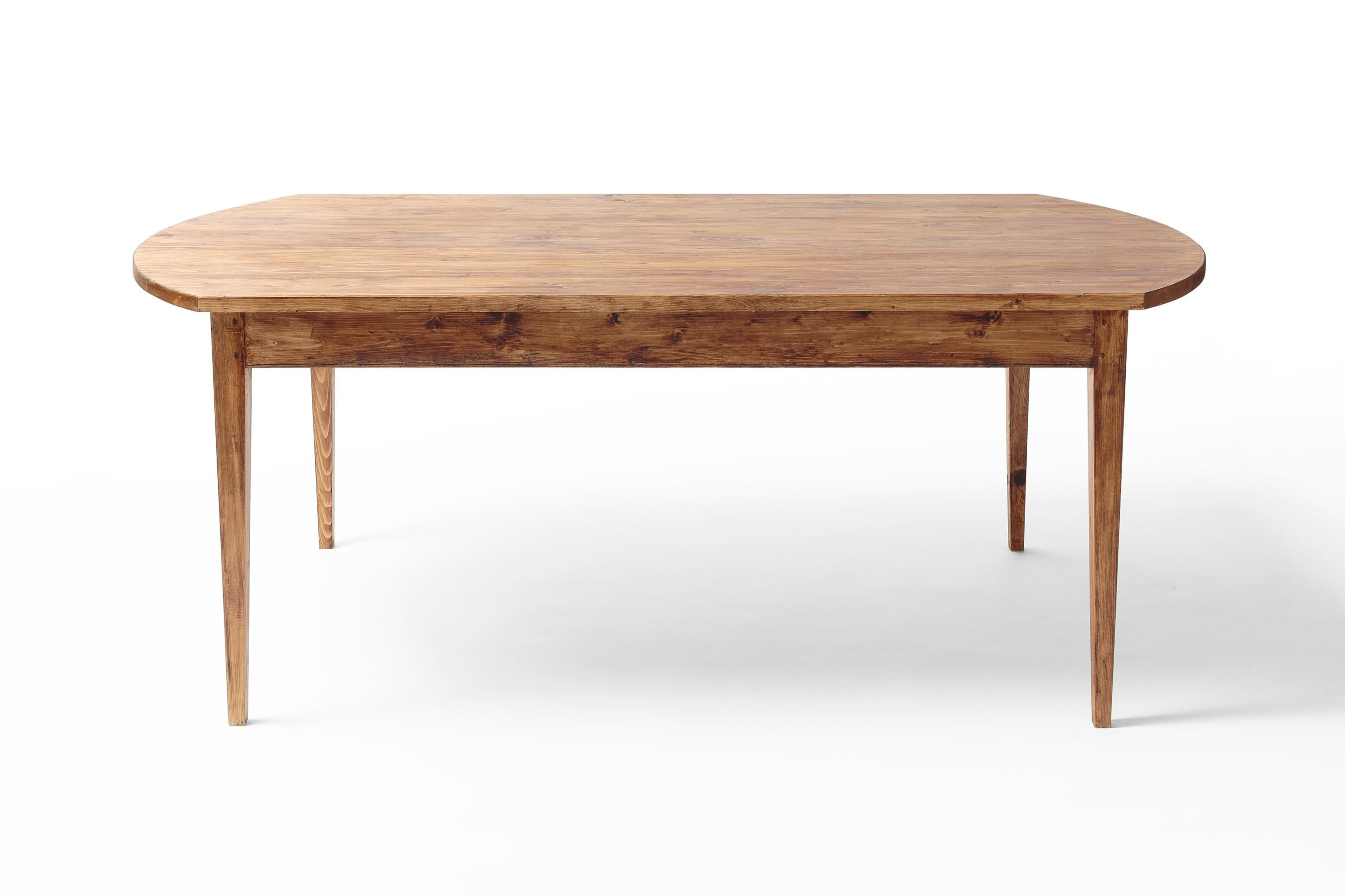 The Adair table is our tribute to English Rustic. Warm, inviting and a love letter to old world craftsmanship, featuring a hand-planed spruce top, pegged tenons, and a waxed finish.

