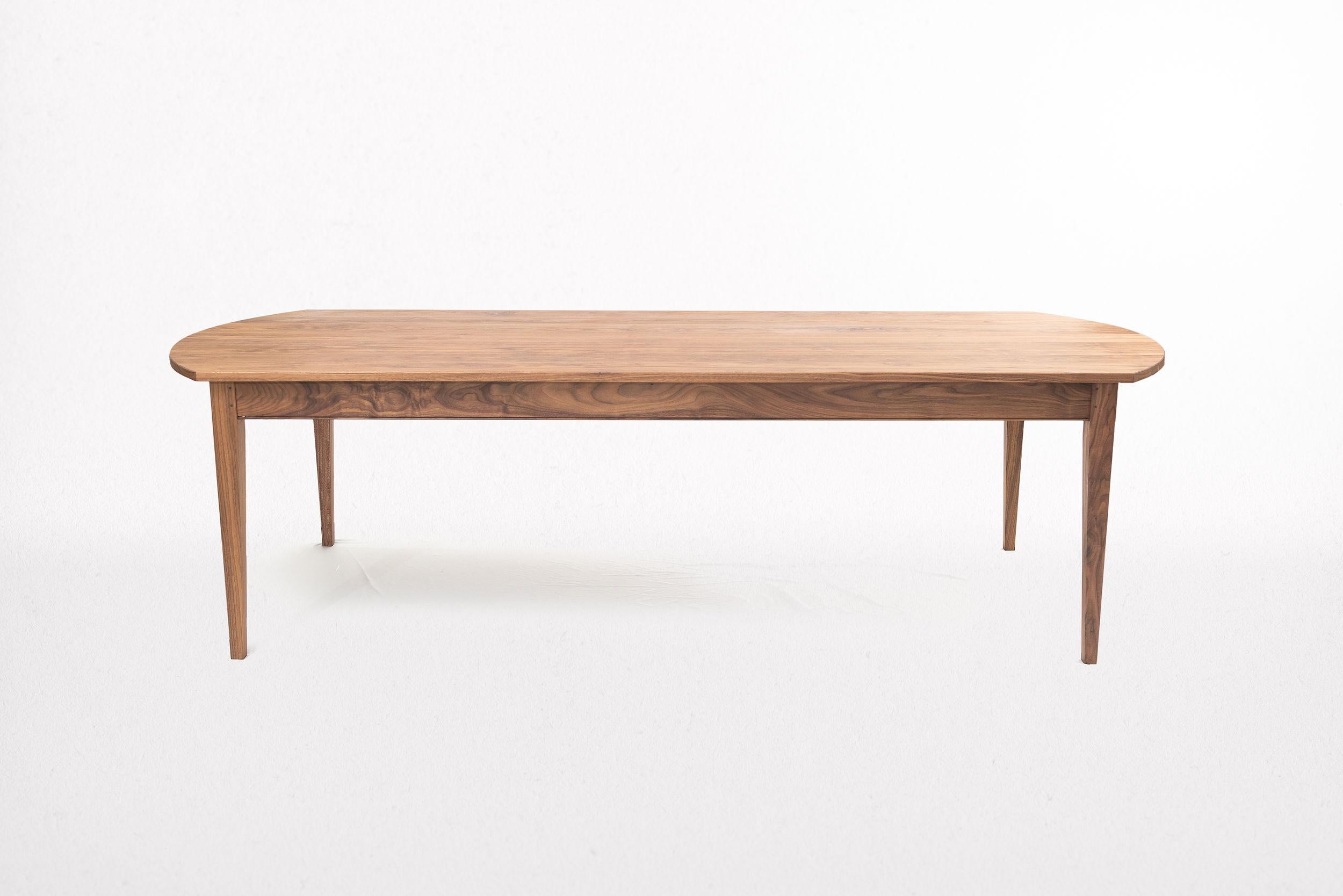 The Adair table is our tribute to English Rustic. Warm and inviting but raised to a more elegant modernity with rich Walnut instead of the traditional Scottish Pine.

While more contemporary in appeal, the Adair Table is still constructed