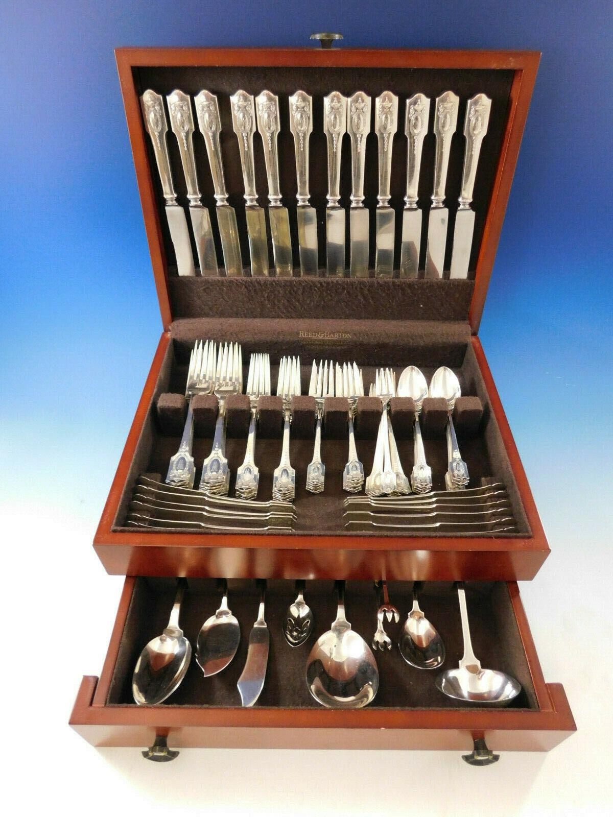 Rare dinner size Adam by Shreve & Co. sterling silver flatware set, 93 pieces. This pattern was introduced in the year 1909 and features an urn overflowing with flowers and swags with a central medallion. This set includes:

12 dinner size knives,