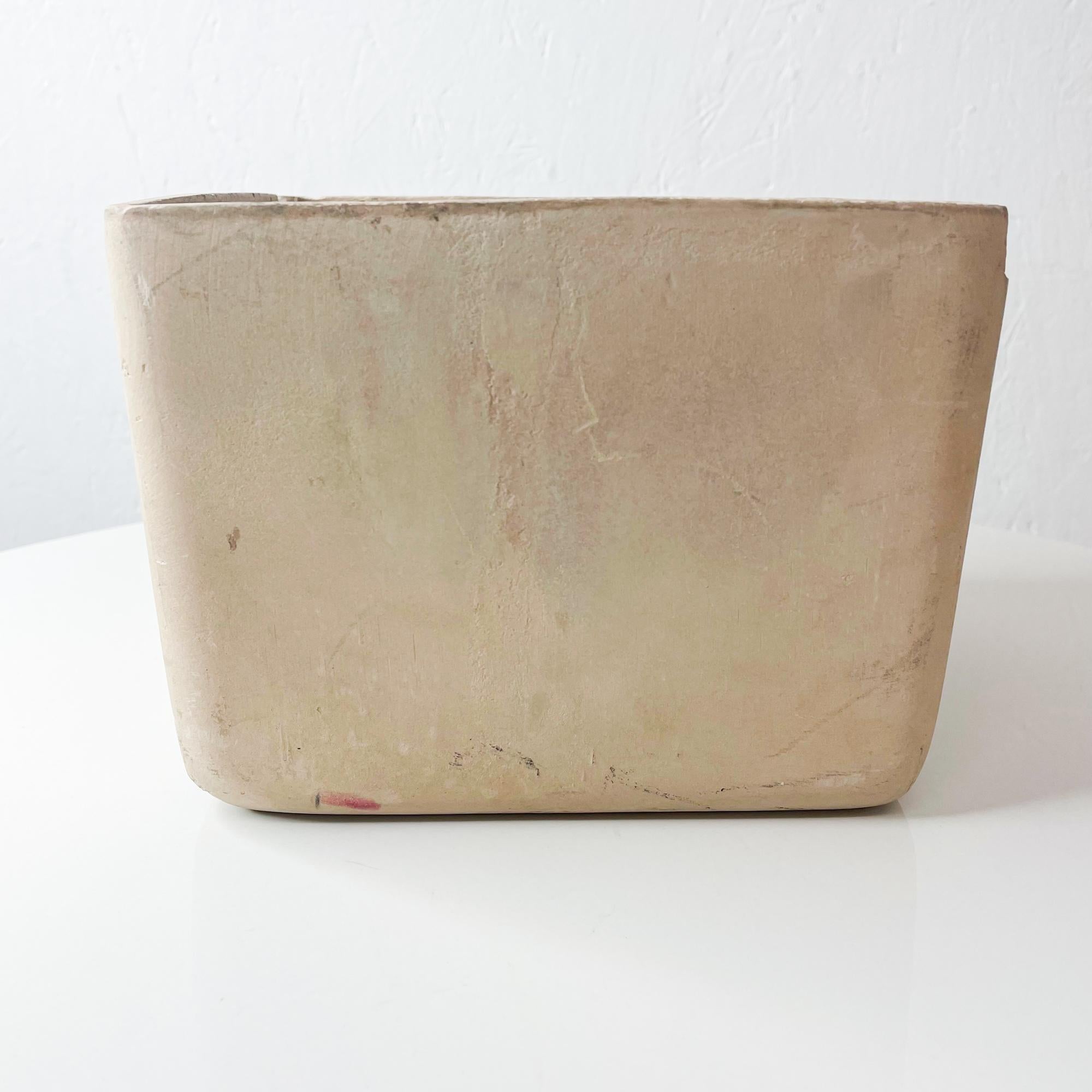 Square Modern Planter
Good looking midcentury Cream Bisque Pottery Planter attributed to John Follis designs for Architectural Pottery
Stamped underneath with makers logo ADAM Ceramics USA.
Measures: 7.25 x 7.25 x 5.5 Tall inches
Unrestored