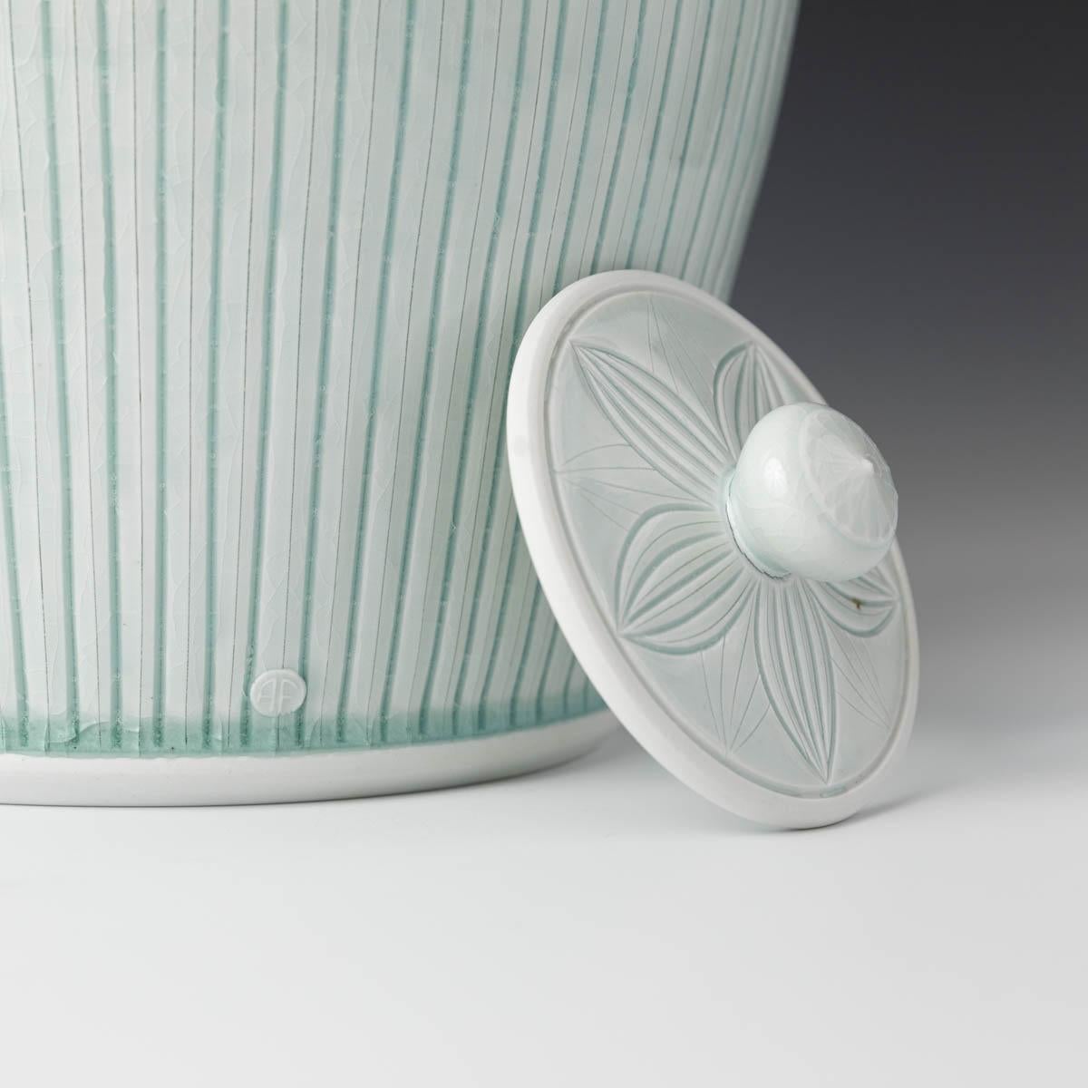 Large Covered Porcelain Jar with Lid- celedon glazed, hand carved, porcelain - Sculpture by Adam Field