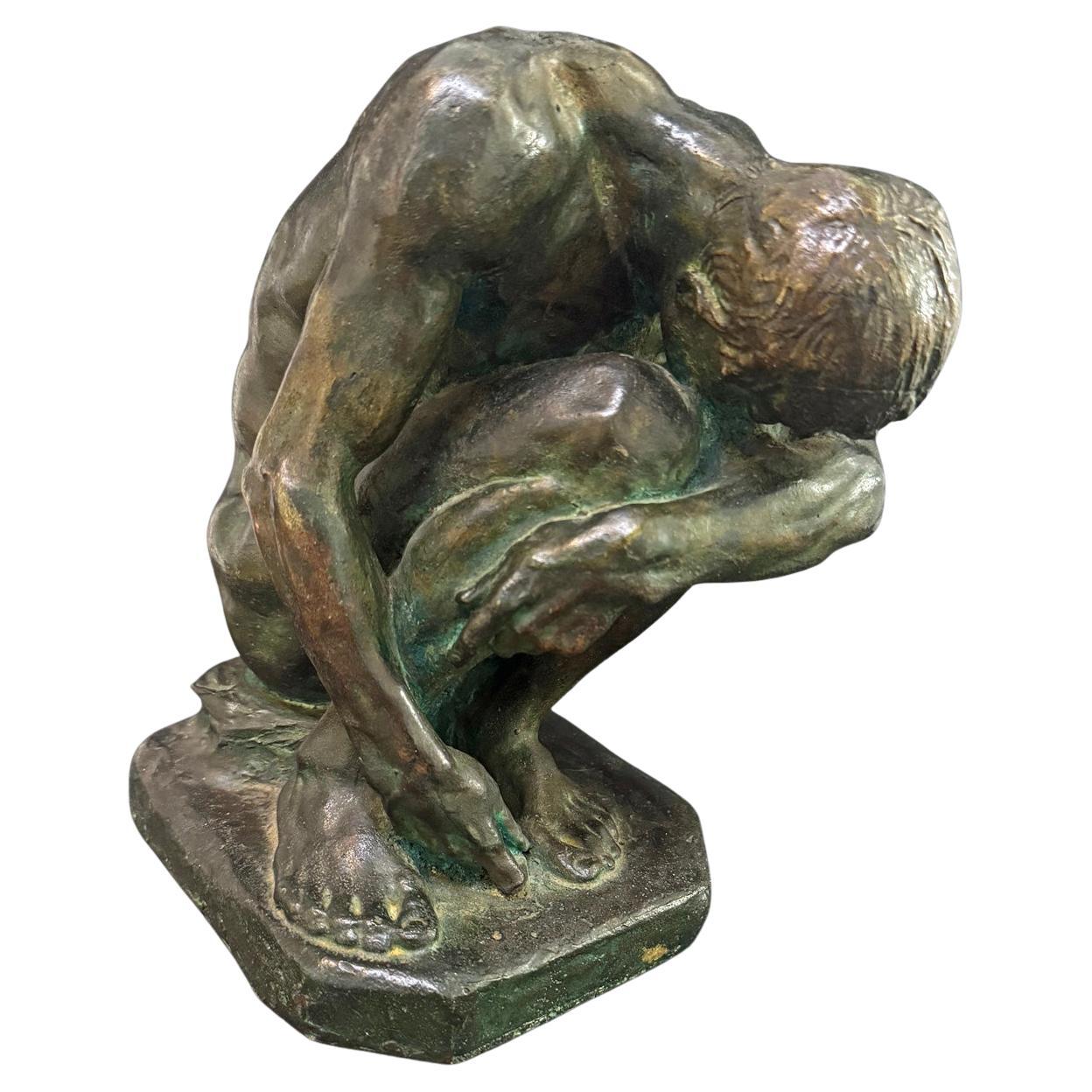 "Adam", apuesto y lustroso bronce de varón desnudo agachado, después de Bartlett