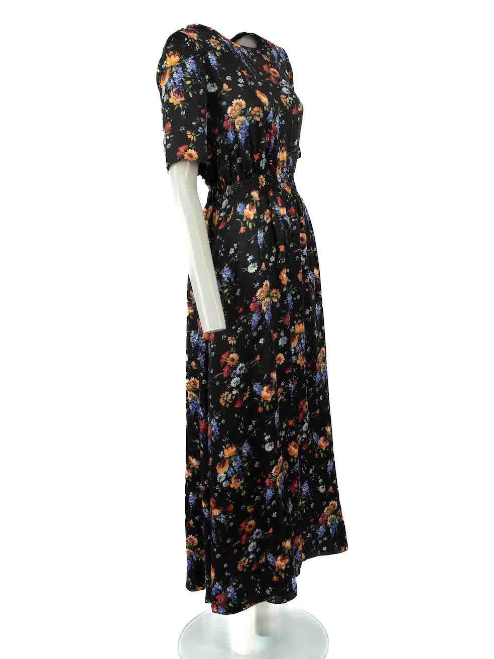 CONDITION is Very good. Hardly any visible wear to dress is evident on this used Adam Lippes designer resale item.
 
Details
Black
Silk
Maxi dress
Floral print pattern
Round neckline
Elasticated waistband
Back button closure
 
Made in USA
