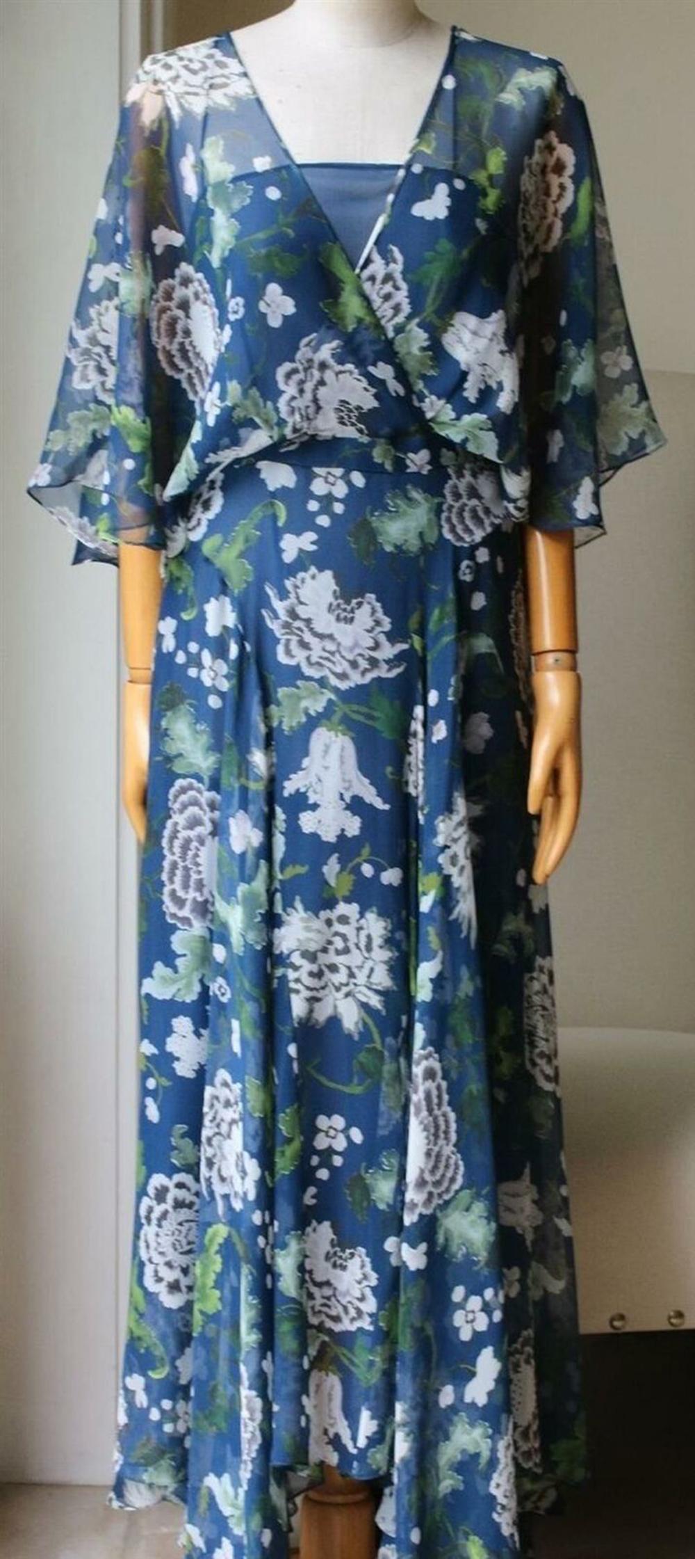 Adam Lippes' diaphanous dress is cut from swathes of silk-chiffon. Decorated with a pretty blue, white and green floral pattern, it has a detachable slip, wrap-effect front and asymmetric hem. Multicolored silk-chiffon. Concealed zip fastening along
