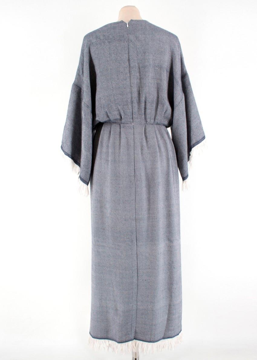 Adam Lippes Fringed Wool-Blend Wrap Dress

*Current Season*

- Grey and ivory stripe intarsia
- V-neckline
- 3/4-length wide sleeves
- Dropped shoulder seams
- Wrap design
- Gathered waist
- In-seam side slip pockets
- Ivory fringed cuffs and hem
-