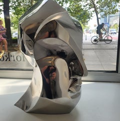 A head. Steel sculpture, minimalistic, cubism, Polish art classic