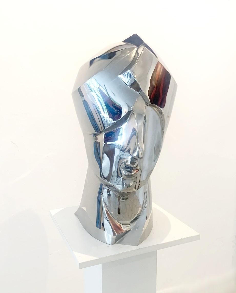 Adam Myjak Figurative Sculpture - A head. Steel sculpture, minimalistic, cubism, Polish art classic