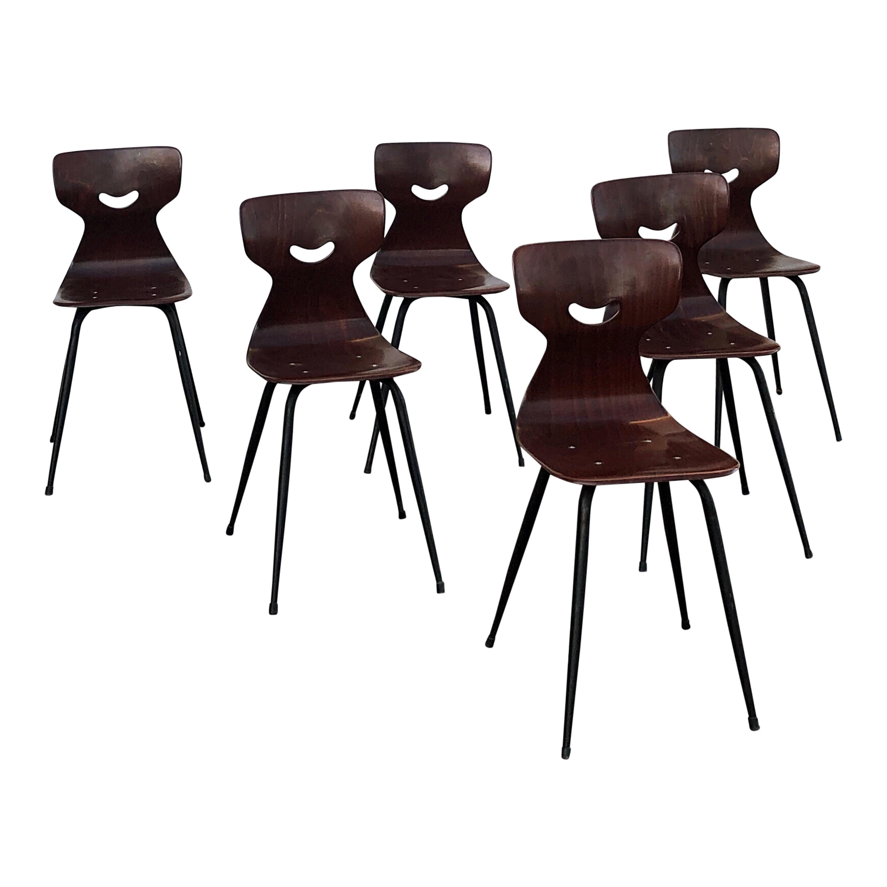 Beautiful industrial strength molded chairs designed by Adam Stegner.
 Made from strong Pagwood shaped seats (Pagwood is high density laminated compressed wood, with orthopedic pelvic and back support without adjustment), set on strong iron tapered