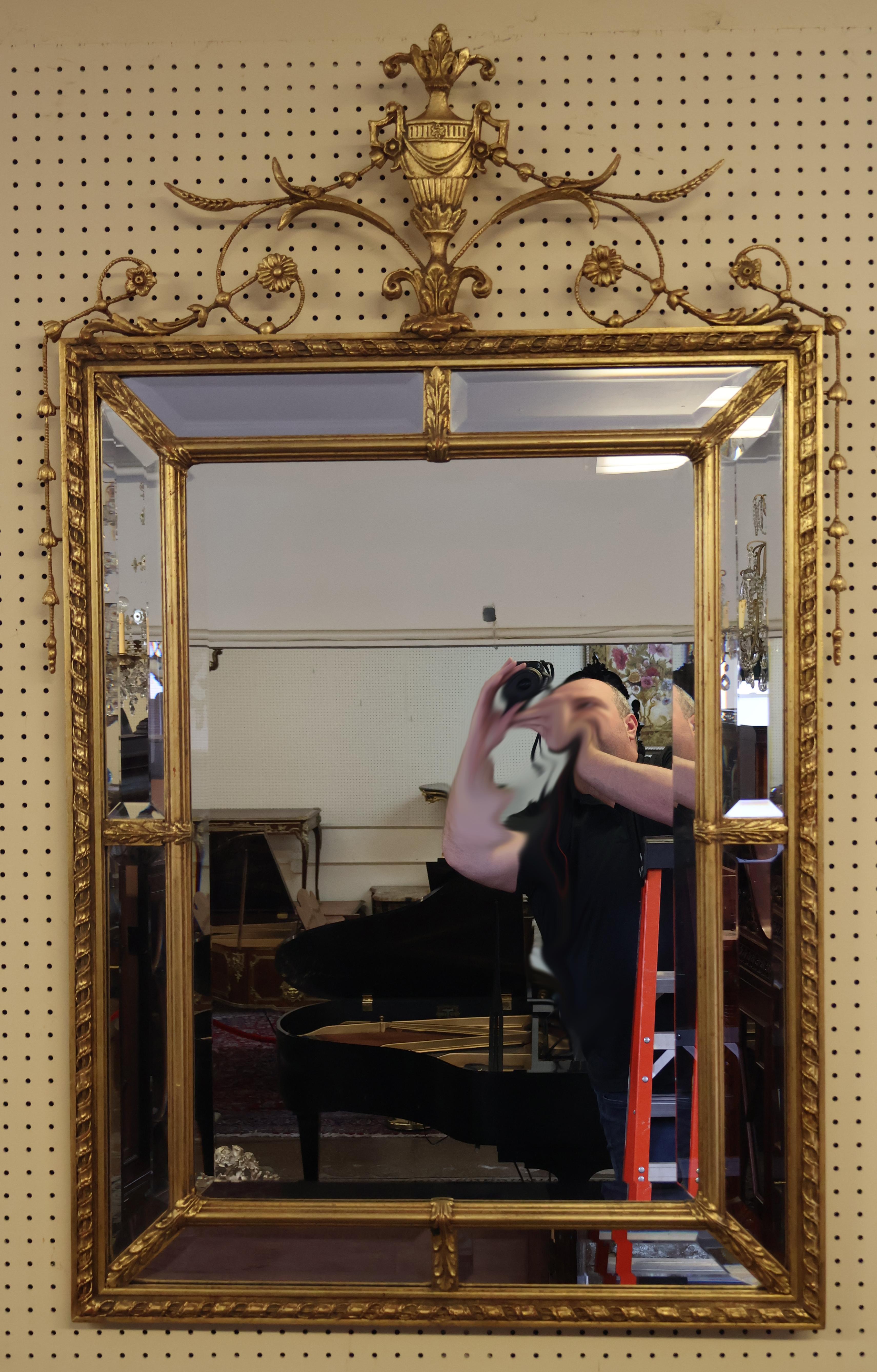 ​Adam Style Gold Gilt Vertical Beveled Mirror Made By Friedman Brothers

Dimensions : 54
