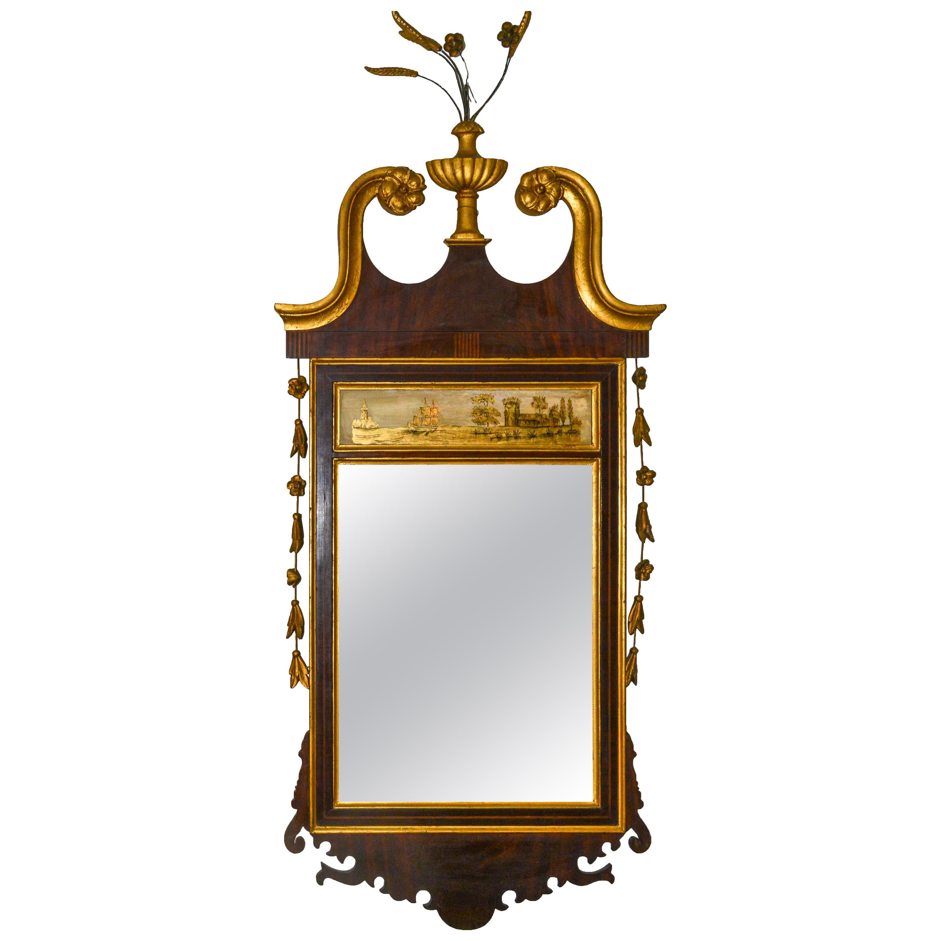Miroir en bois doré peint à l'envers de style Adam