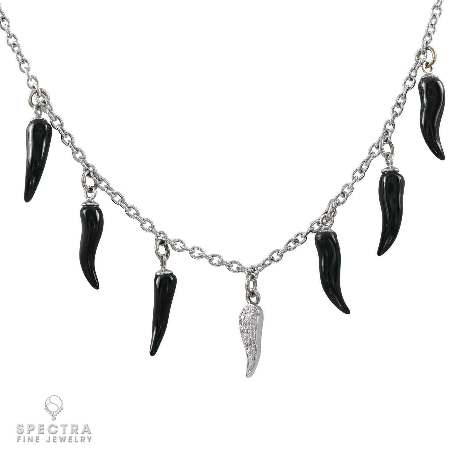 Everyone could use a little extra good luck, especially when it comes in such a lovely form as a charm necklace. This Adamas Cornicello Diamond Onyx Necklace features 7 cornicelli (singular, cornicello or corno portafortuna), or Italian horns, in