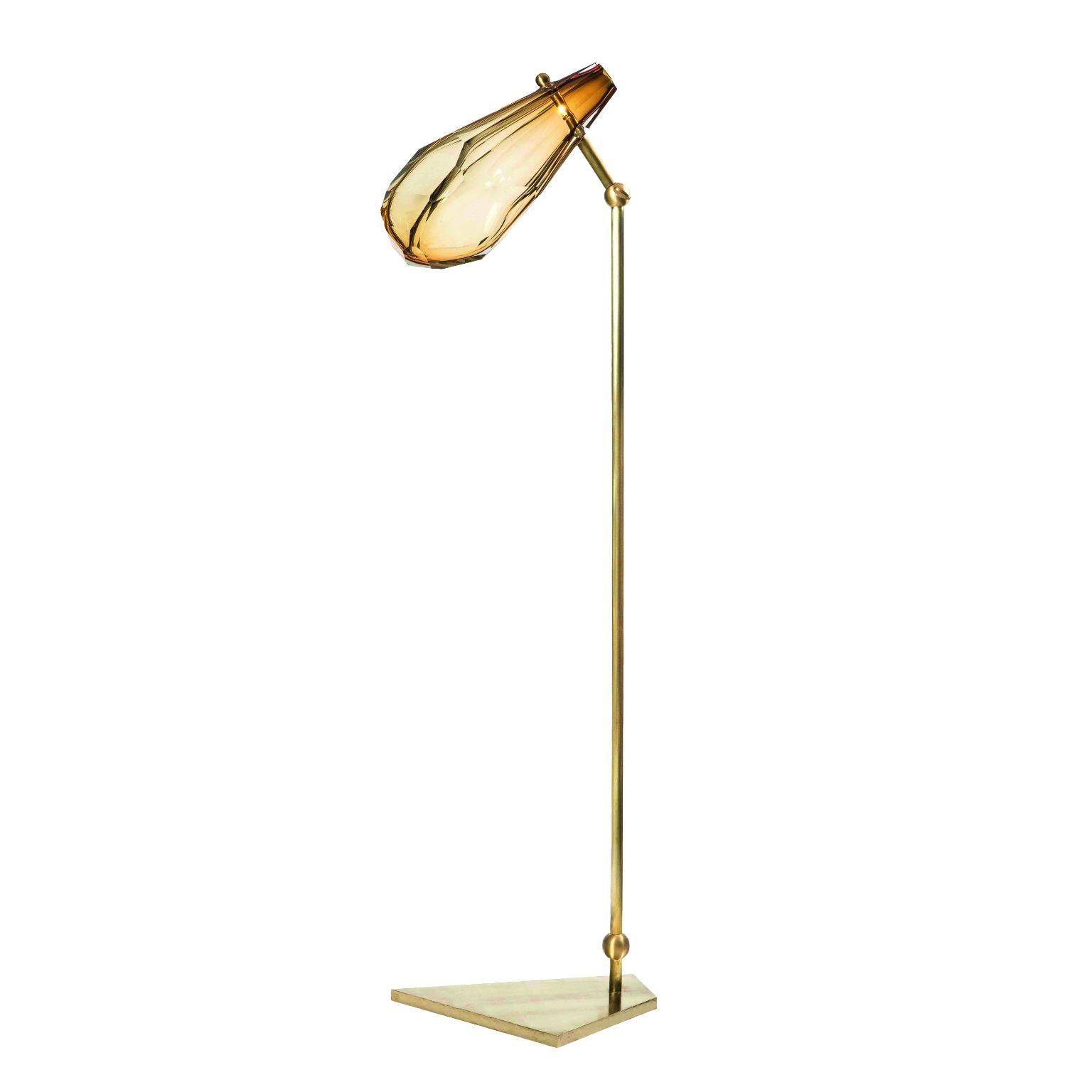 Adamas floor lamp by Emilie Lemardeley
Dimensions: D 40 x H 160 cm
Materials: Brass, glass
Weight: 35 kg

The ADAMAS lightings take their inspiration from Greek myth; the story of a young man transformed into a precious stone, a diamond, by the