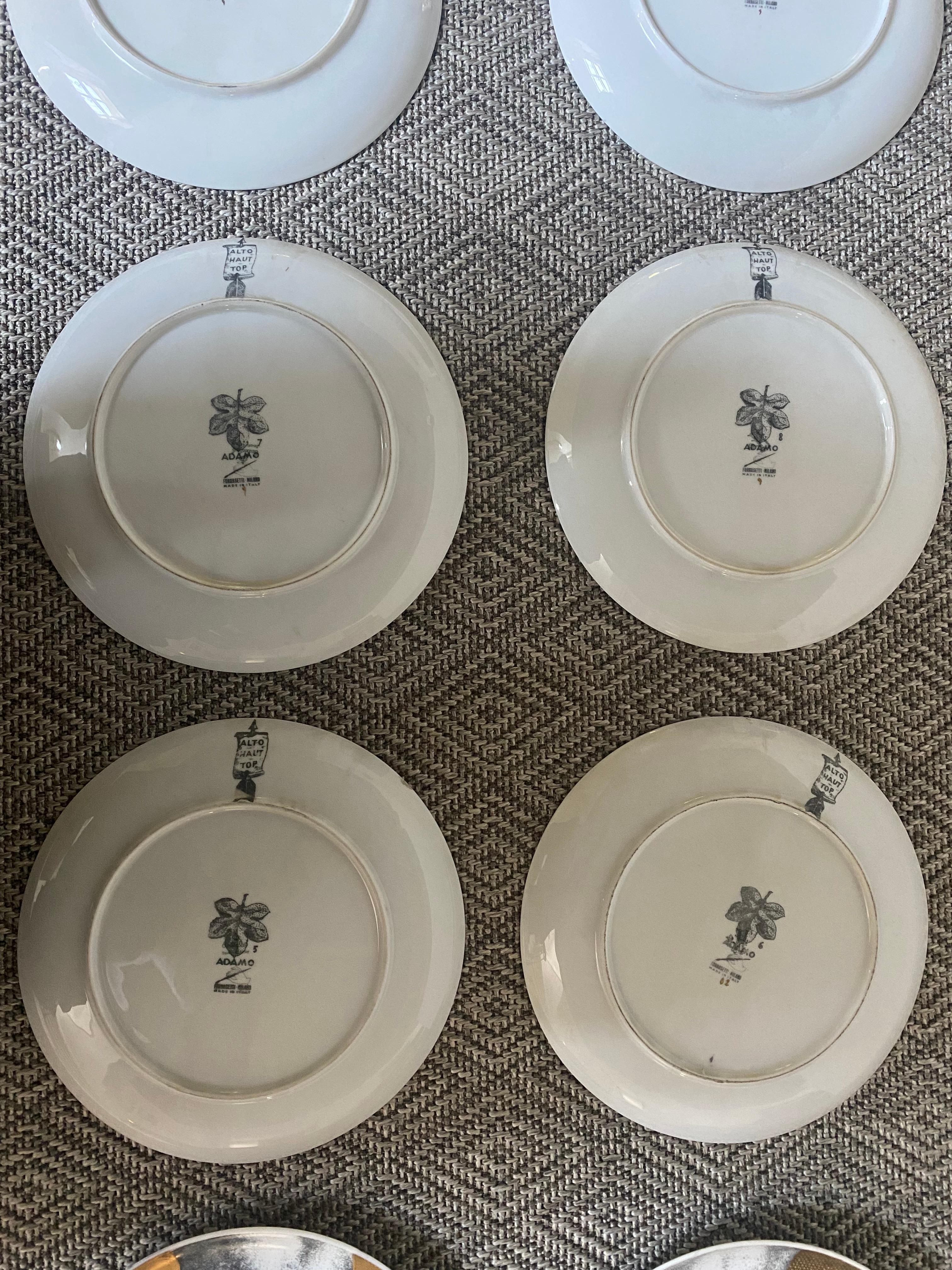 Italian Adamo Set of 12 Fornasetti Plates Gilt Background Black White Print Midcentury For Sale