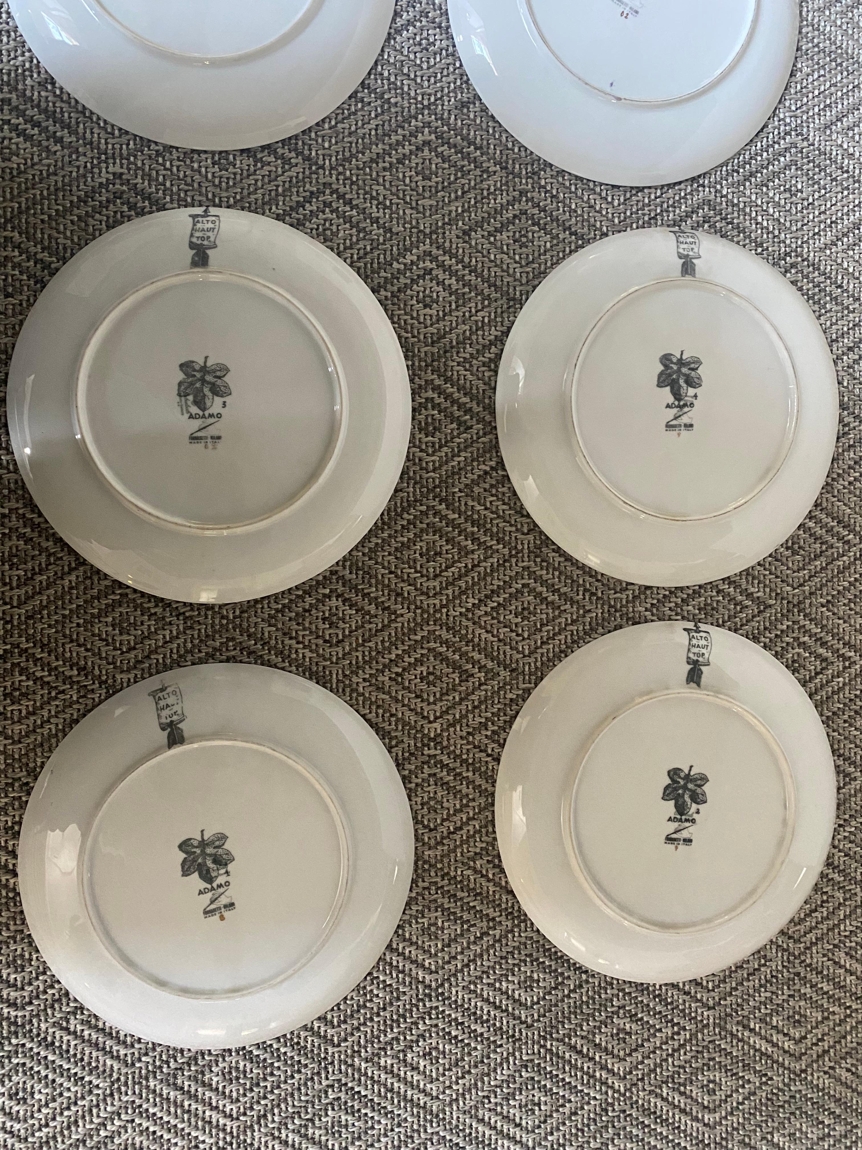 Adamo Set of 12 Fornasetti Plates Gilt Background Black White Print Midcentury In Good Condition For Sale In Bridgehampton, NY