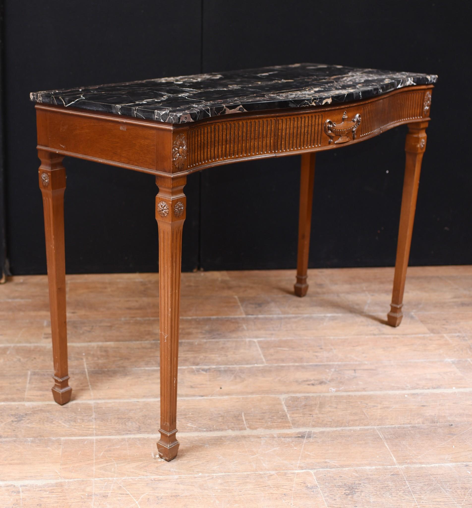 Gorgeous Adams style console table in mahogany with marble top
Drawer on front opens out to offer more storage
Classical motifs such as wide urn and rosettes to top of fluted legs 
Marble top is smooth and chip free
Offered in great shape, ready