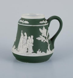 Adams, England, miniature vase and miniature mug in biscuit porcelain.