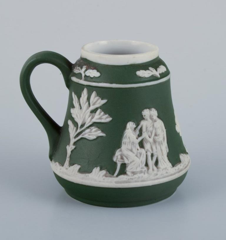 Neoclassical Revival Adams, England, miniature vase and miniature mug in biscuit porcelain.  For Sale