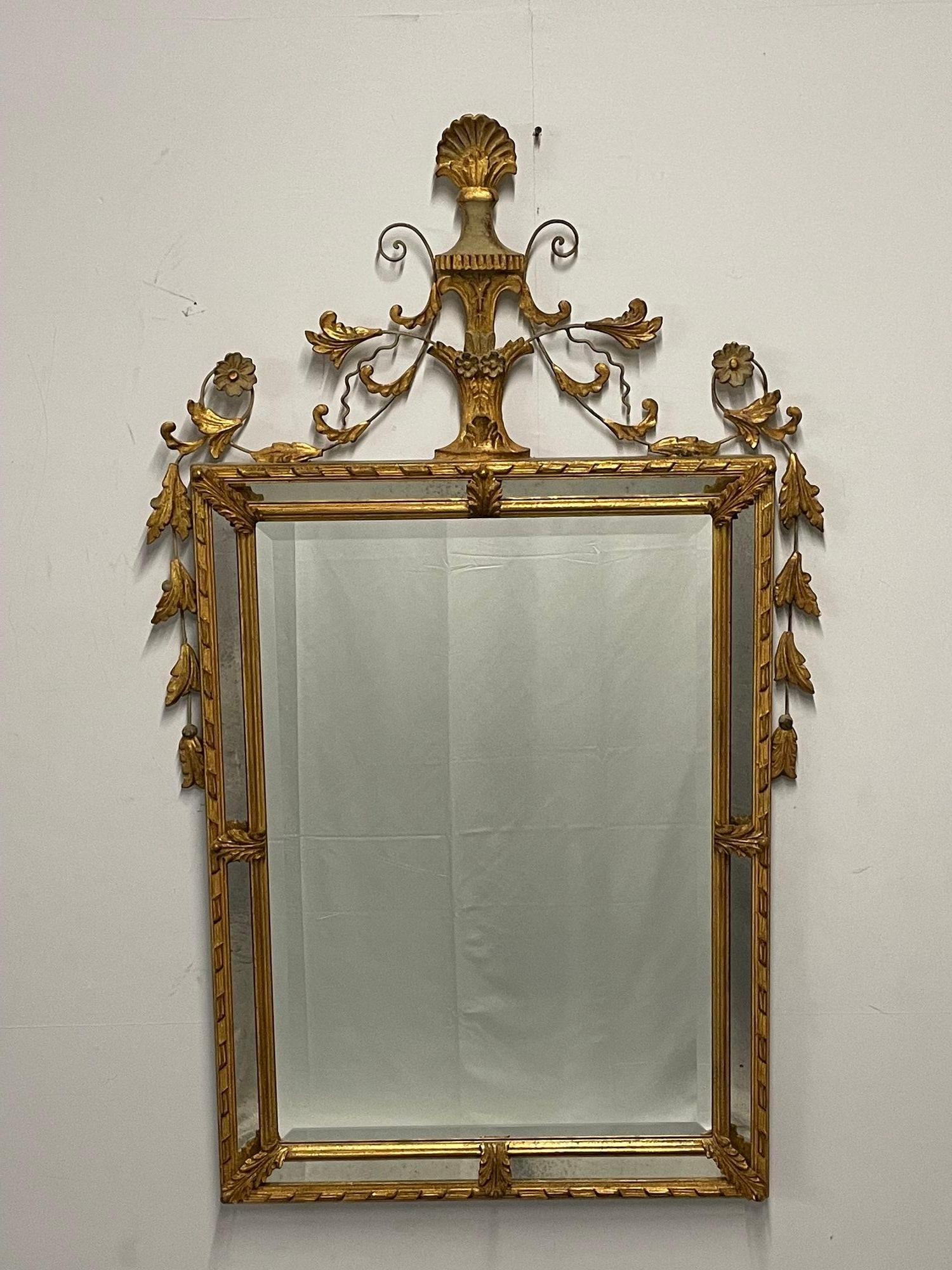 Adams Style Wall / Console / Pier Mirror, Giltwood, Floral Motif
Most likely Freidman Brothers. This fine decorative wall or console mirror is reminiscent of the Adams era. Having a clean center mirror panel flanked by clay under gilt design with