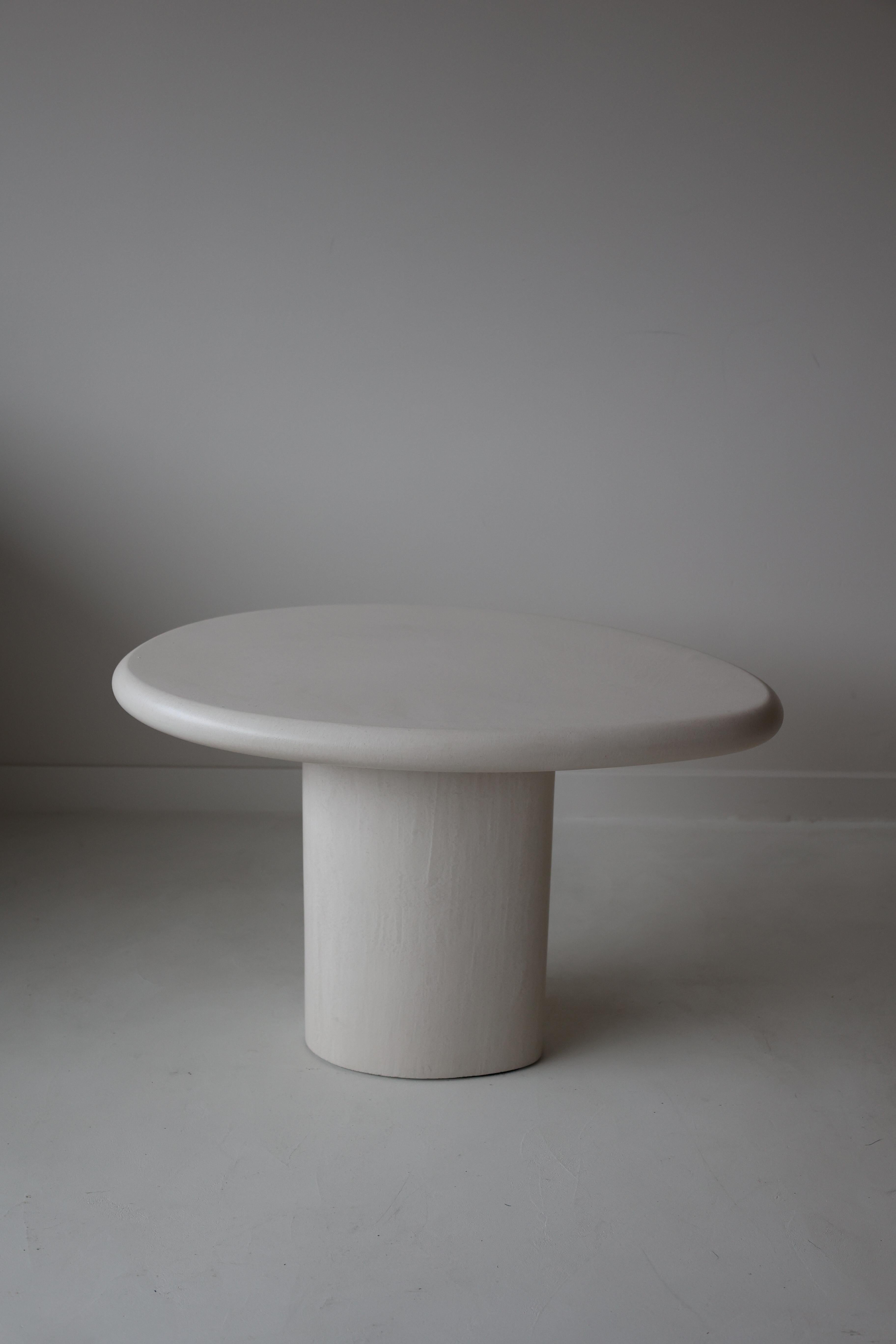 Adana Side Table by Kasanai
Dimensions: D 64 x W 43 x H 42 cm.
Materials: Lime plaster.
Also available in different colors. Please contact us.

Sometimes, simple is best. Adana follows the principle of minimalist simplicity with a pure, natural