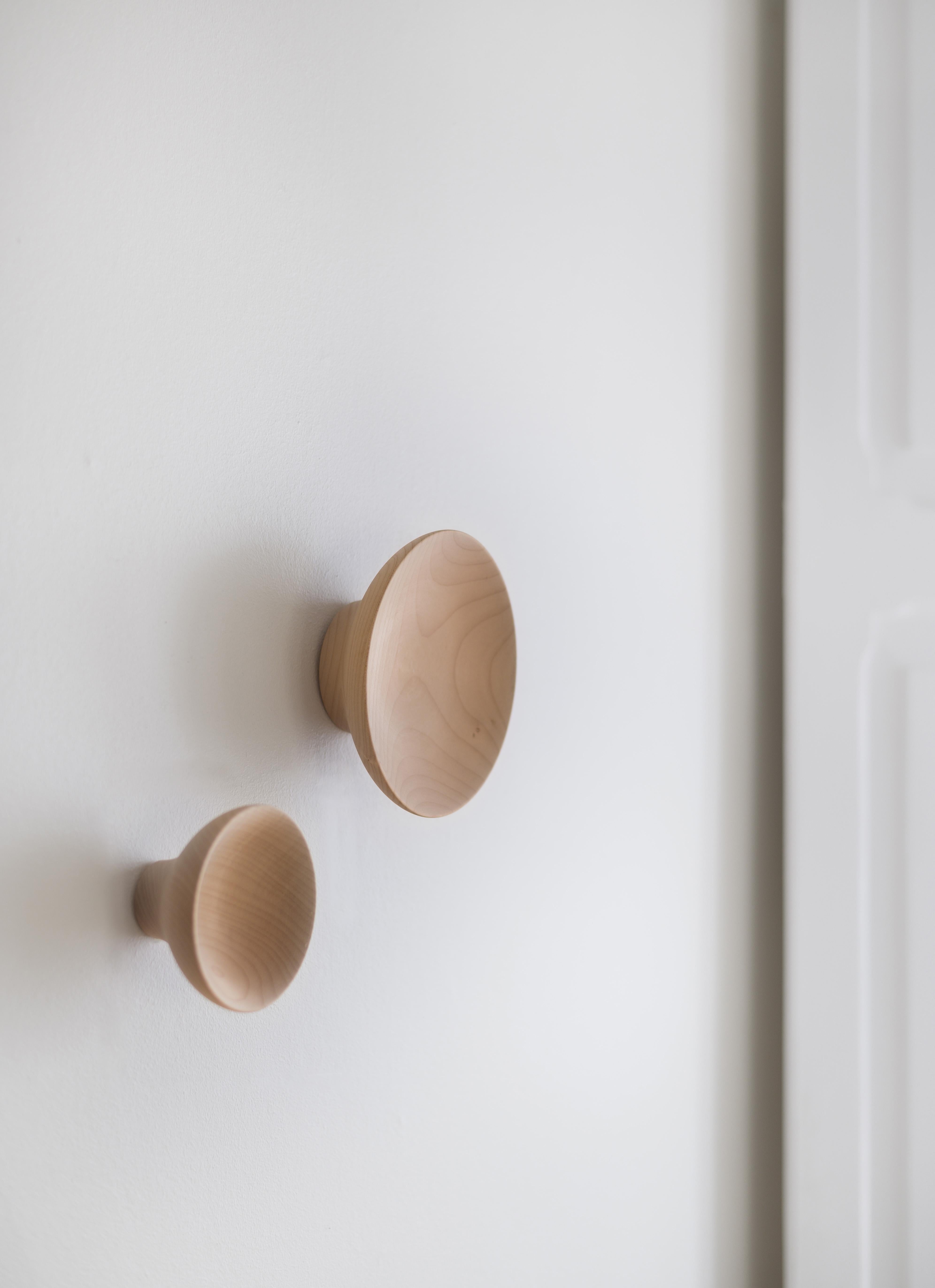 The Adão coat peg is hand turned from Portuguese chestnut wood by master wood turner Carlos Barbosa. In the true spirit of Origin, the coat peg is named after the craftsman who first made it, Adão Gomes. Designed by Pauline Deltour to be significant