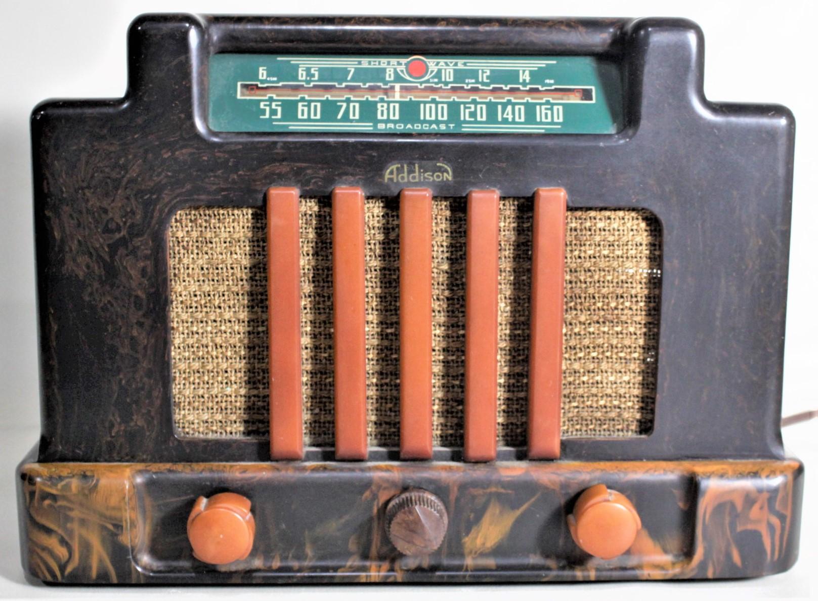 This Art Deco styled vintage tube radio was made by the Addison Industries Ltd. of Canada in circa 1939. This is Addison's Model 5D, otherwise known as the 'Courthouse