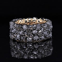 A.Deitiy wedding ring made with recycled sterling silver and mined diamonds