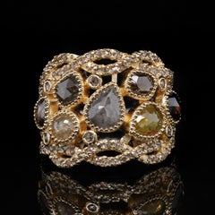 Adeitiy cocktail ring made with recycle silver, gold plating & fancy-cut diamond