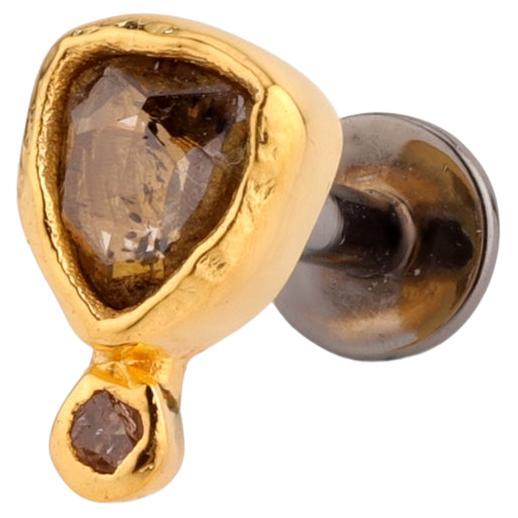 A.deitiy piercing fabricado con plata de ley reciclada y diamante minado