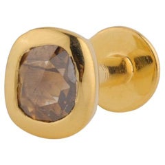 A.deitiy piercing made with recycled sterling silver and mined diamond