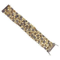 A.deitiy silver bracelet with flat diamonds 
3 micron yellow gold plating