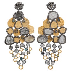 A.deitiy silver earrings with flat diamonds 
3-micron gold 
rhodium plating