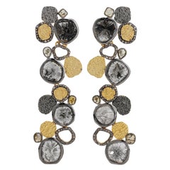 A.deitiy silver earrings with flat diamonds 
3-micron gold 
rhodium plating