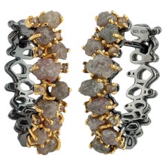 A.deitiy silver earrings with mined diamonds, 3micron gold & rhodium plating 