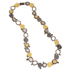 A.deitiy silver necklace with flat diamonds & 3 micron yellow gold plating