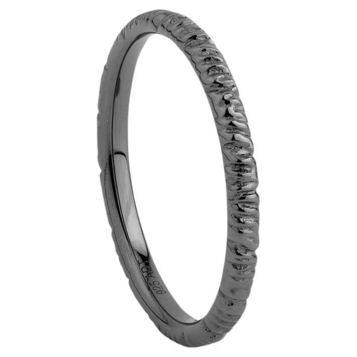 A.deitiy thin band made with recycled silver, and black rhodium plating