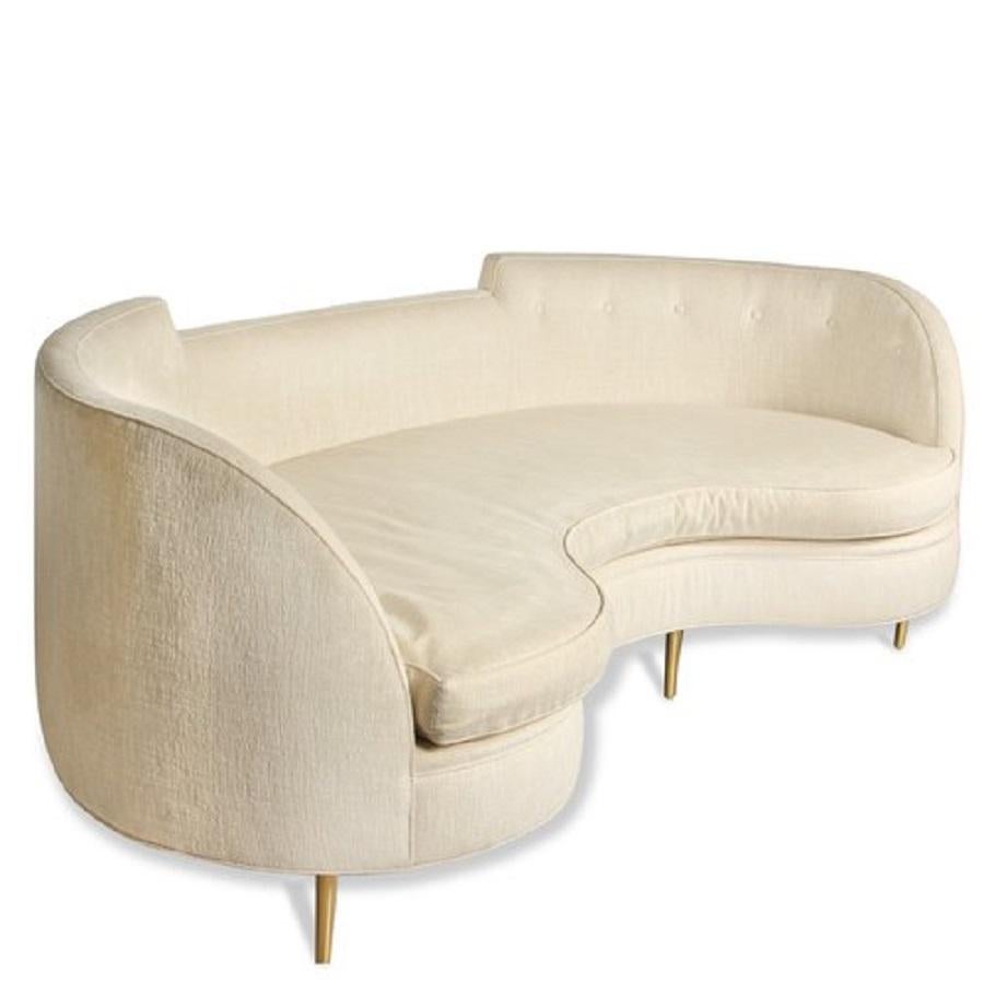 Adelina sofa by Edward Wormley for Dunbar.

Curved seat complmented by brass legs.