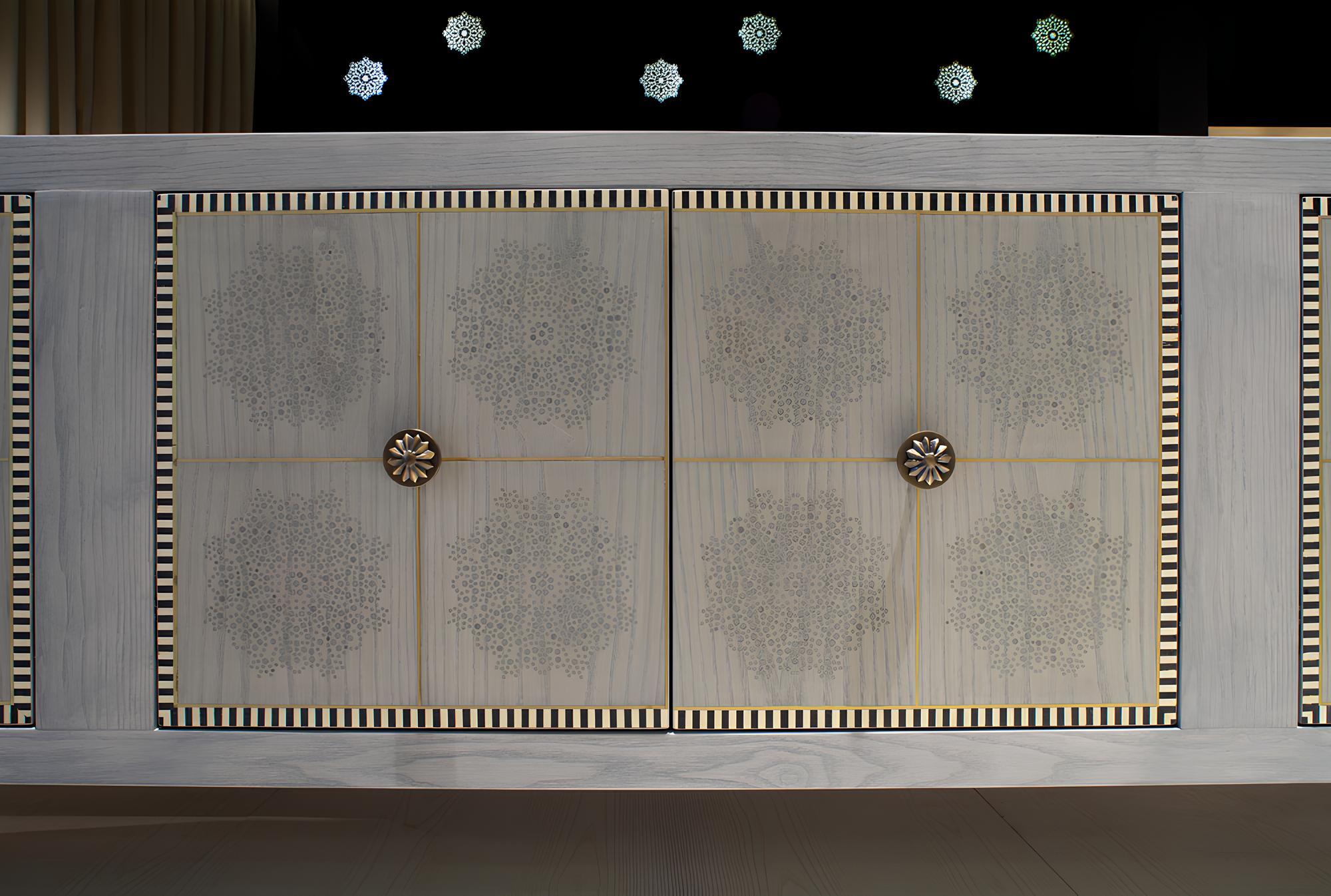 
Introducing the Adelphi sideboard designed by Archer Humphryes Architects—a testament to exquisite craftsmanship and refined design. This wooden long sideboard boasts a commanding presence with its rigorous and linear profiles, capturing the