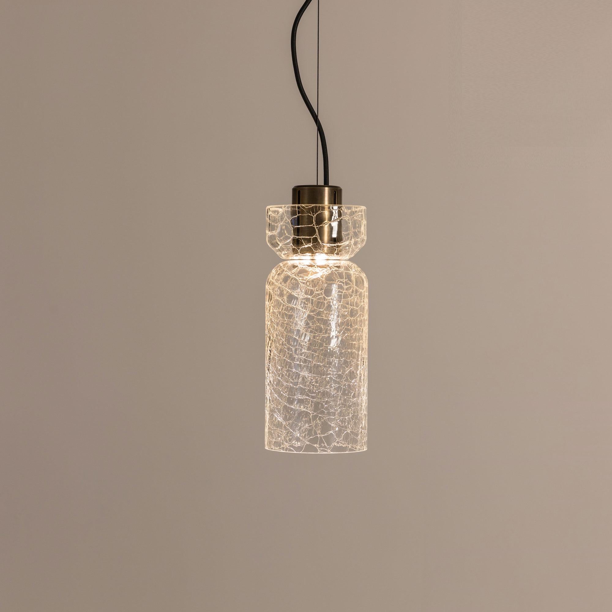 ADesignStudio Crackle S3 Pendant Light
 
ADesignStudio’s Crackle collection sparks intrigue when hung from above. The design draws on Greenway’s system of lighting components referencing Australia’s historic maritime architecture. The outer glass