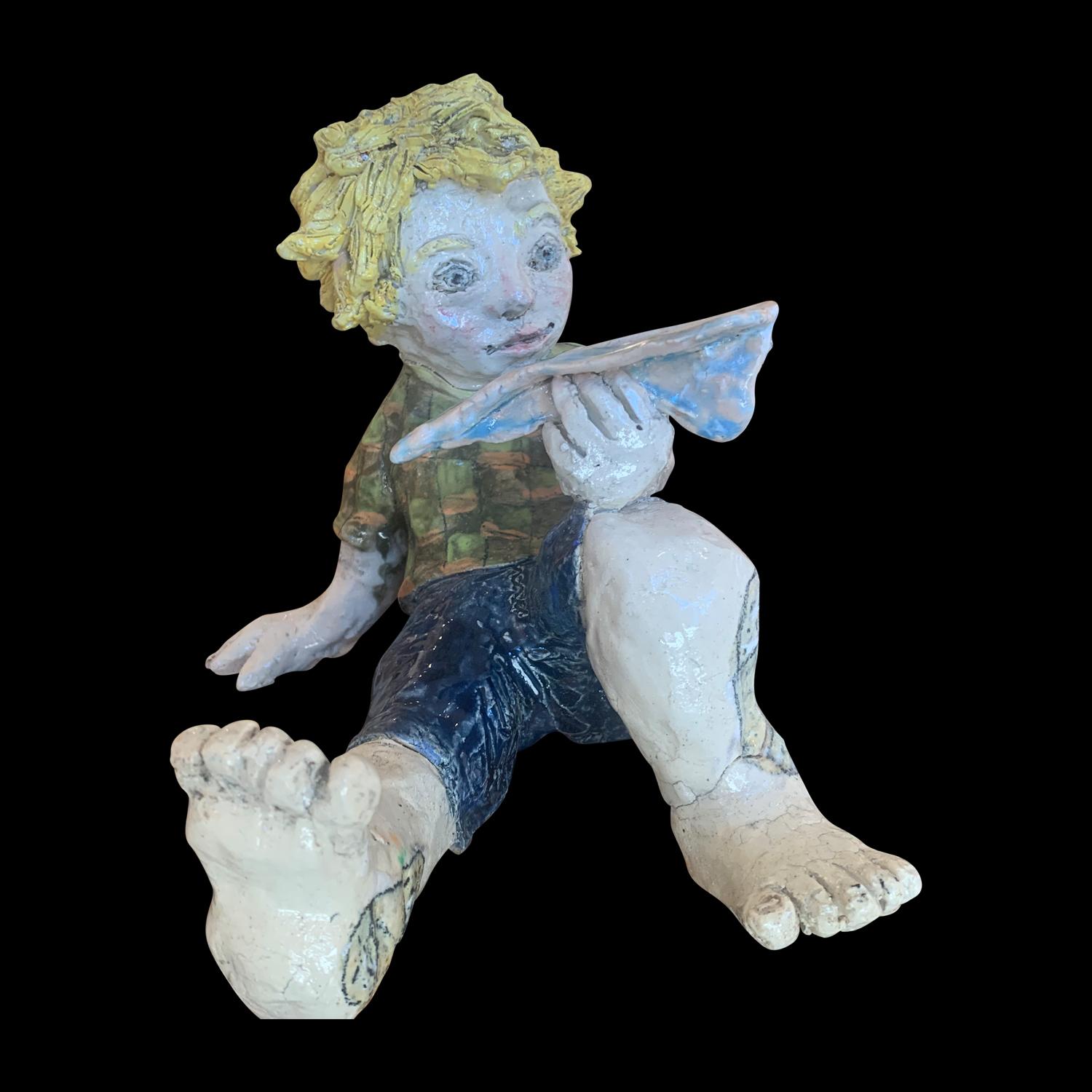 Adi Rom Figurative Sculpture - Young Boy and Paper Plain Figurative Naive Art Ceramic Sculpture 1 of 1 by Adi