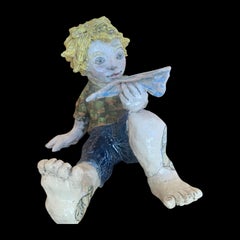 Young Boy and Paper Plain Figurative Naive Art Ceramic Sculpture 1 of 1 by Adi