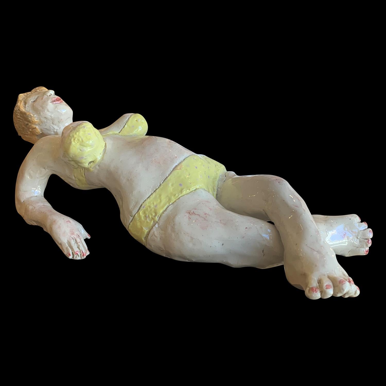 Adi Rom Figurative Sculpture - Woman Sunbathing With Yellow Swimsuit Glazed Ceramic Sculpture 1 of 1 by Adi