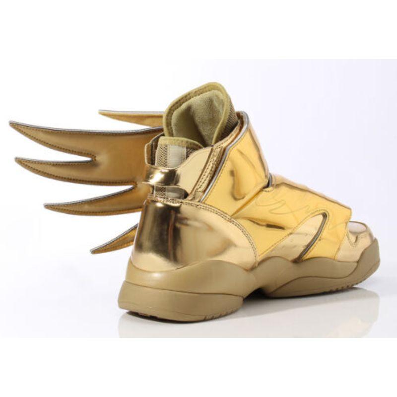 Adidas Jeremy Scott Wings 3.0 Metallic Gold Batman Shoes SZ 4 100% Authentic

Additional Information:
Material: Patent Leather/Synthetic leather upper
Color: Gold
Pattern: Solid
Style: Athletic Sneakers/casual
Size: 4 US
100% Authentic!!!
Condition: