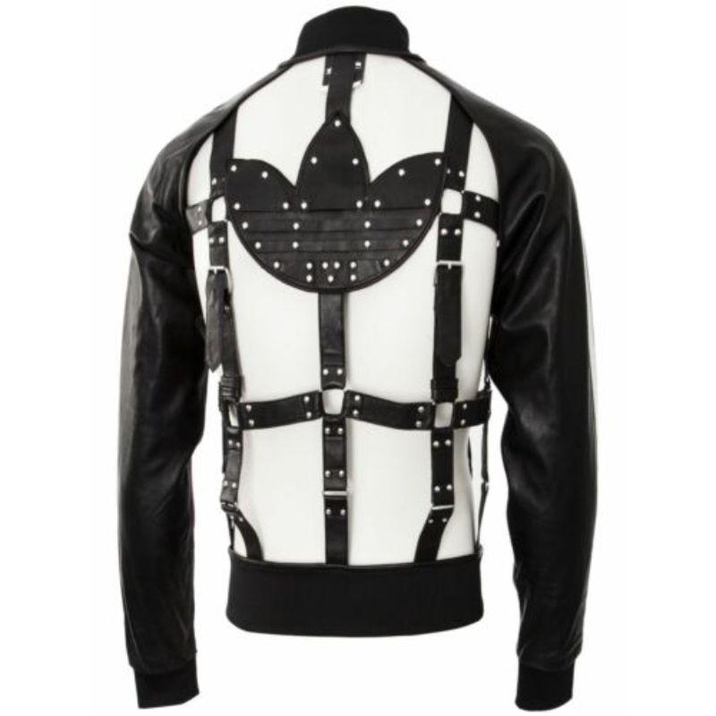 Adidas Originals x Jeremy Scott JS Unisex Bondage Cage Leather Black Jacket LMT!

Additional Information:
Material: 100% Leather
Color: Black
Pattern: Cage / Bondage
Style: Bondage Jacket
Size: M
100% Authentic!!!
Condition: Brand new with tags
