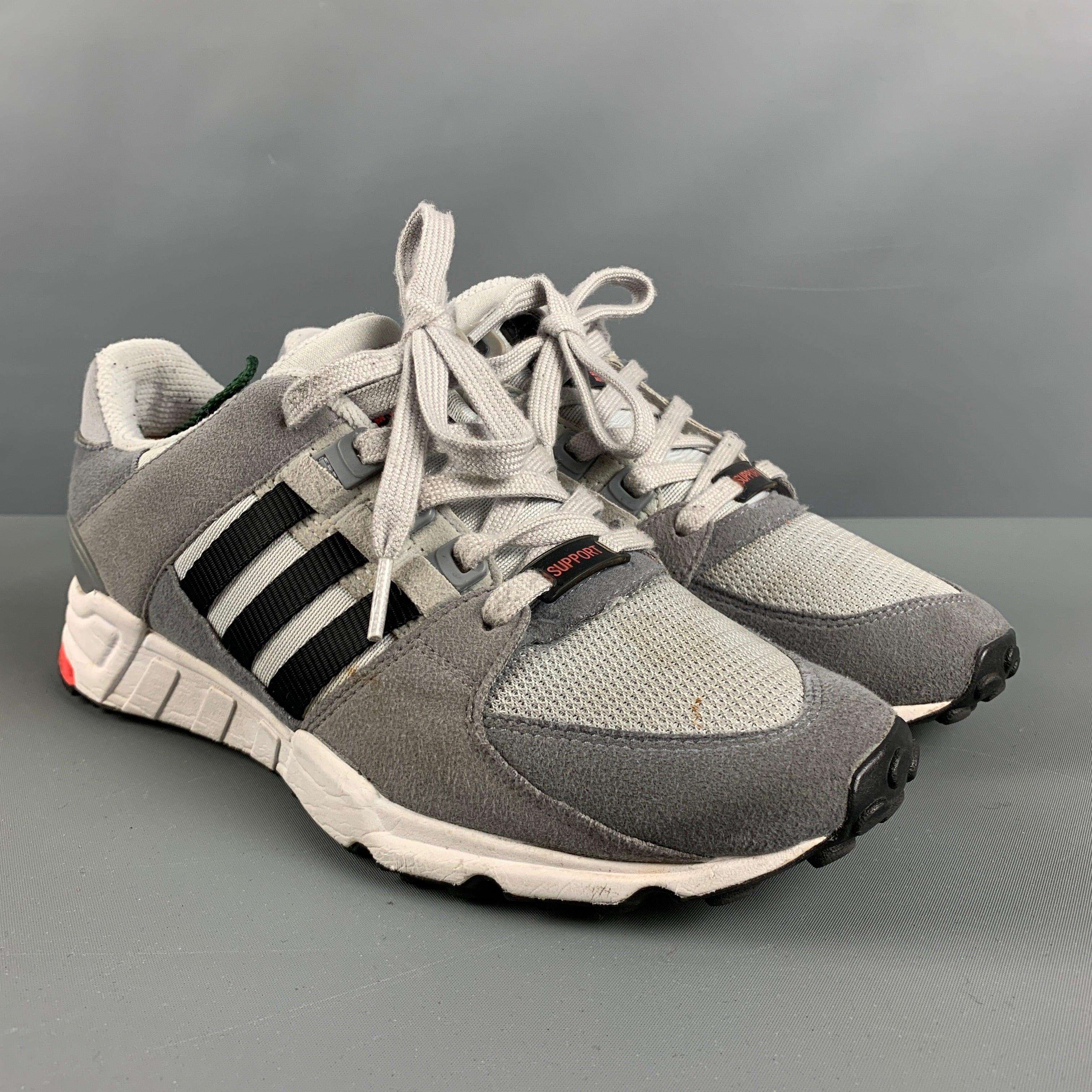 ADIDAS x EQUIPMENT sneakers comes in a grey and white mixed material featuring a low-top style, chucky rubber sole, and a lace up closure.Good Pre-Owned Condition. Moderate signs of wear. 

Marked:   8.5Outsole: 11 inches  x 3.5 inches  
 
  
  
