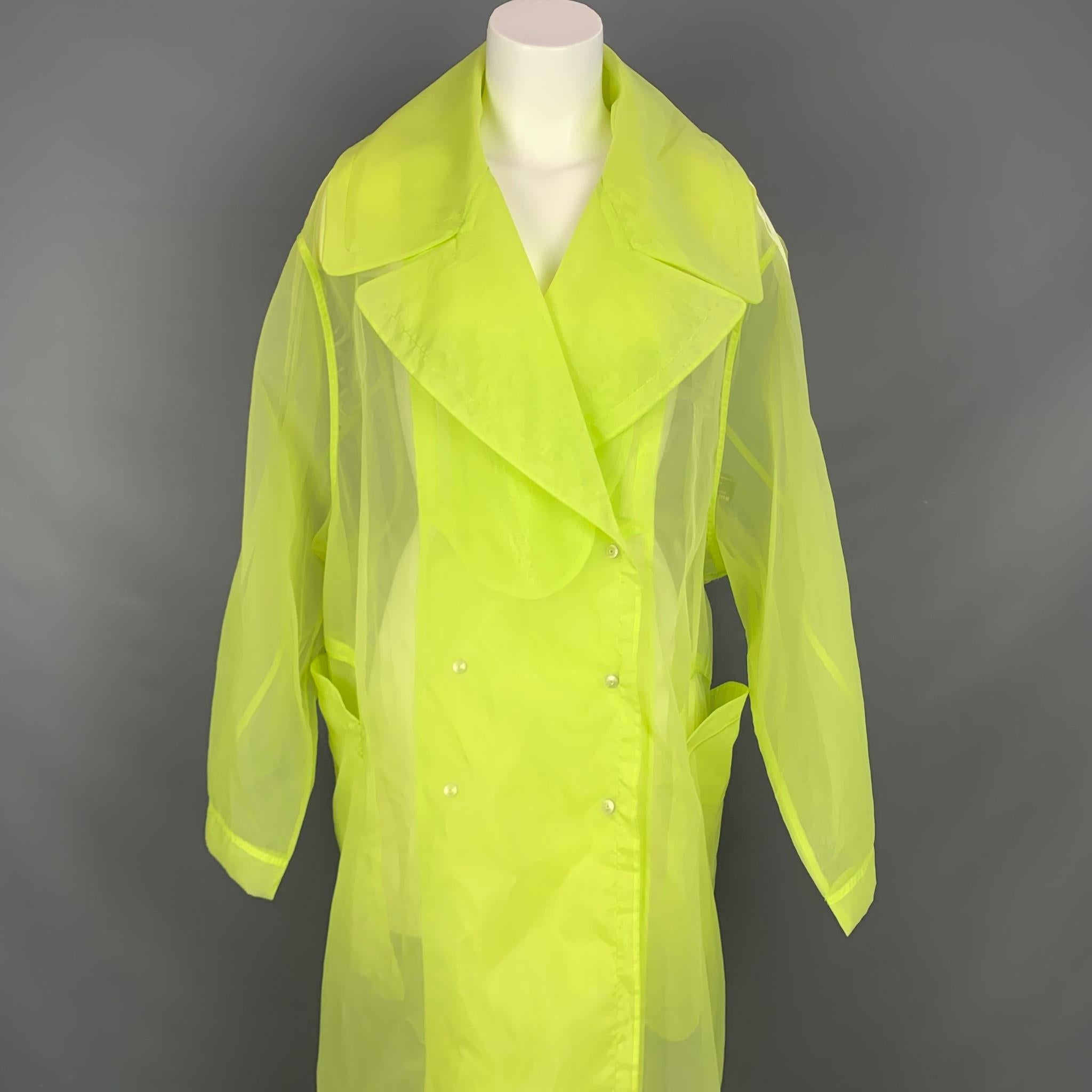 ADIDAS x IVY Park Mantel aus gelbgrünem:: transparentem Organza-Nylon mit übergroßer Passform:: asymmetrischem Stil:: großen Taschen und zweireihigem Verschluss. 

Sehr guter gebrauchter Zustand. 
Markiert: S

Maße: 

Schultern: 19.5 in. 
Büste: 54