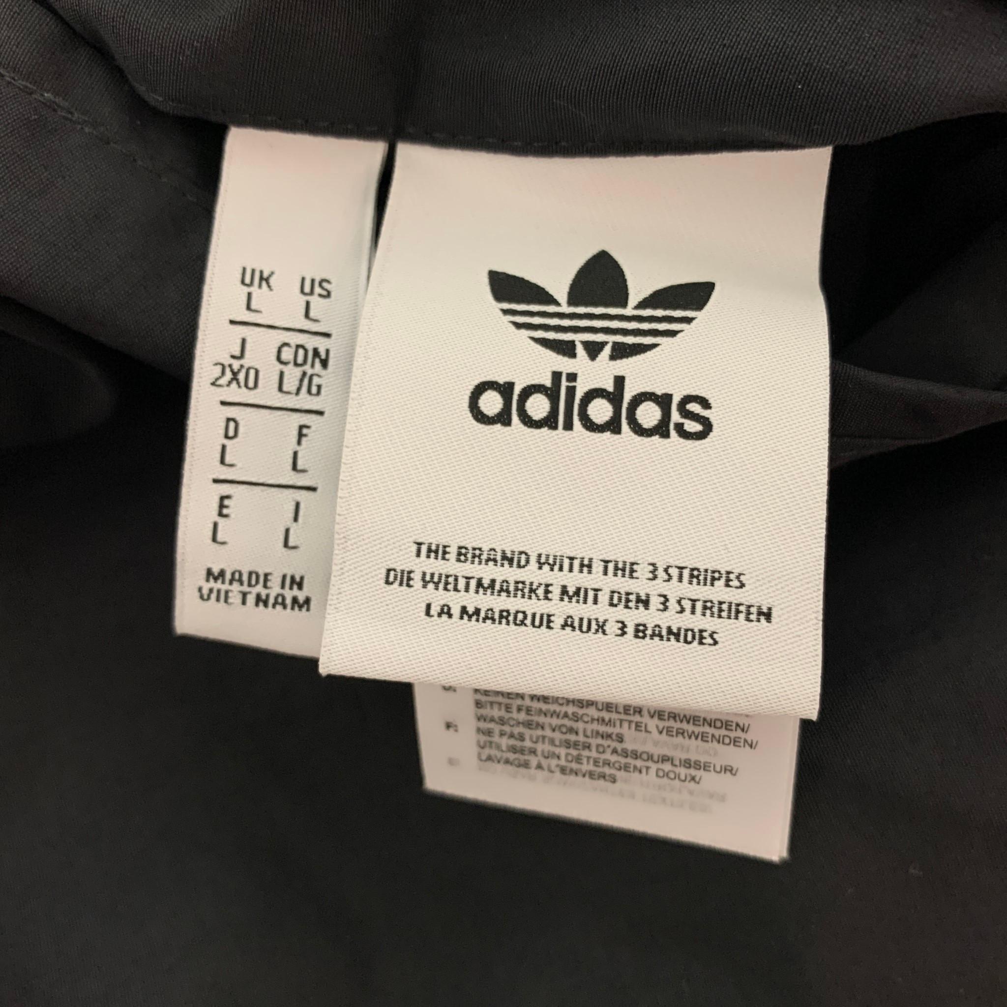 ADIDAS x UNITY - Combinaisons réversibles en nylon noir et graphique multicolore, taille L 3