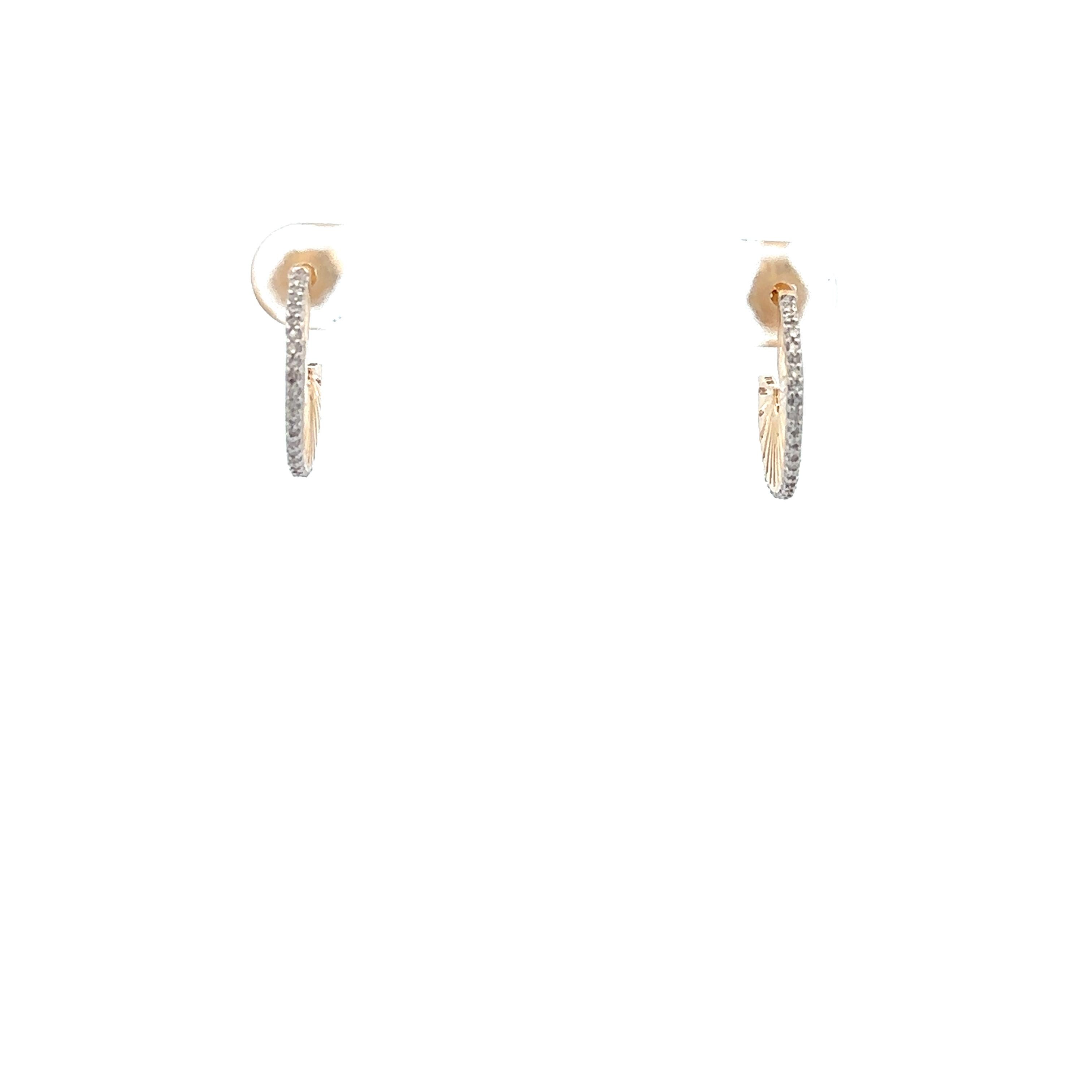 Adina Reyter Diamant Rays J Creolen - Y14 mit Diamanten
Ohrringe aus 14 Karat Gelbgold mit handgefassten Pavé-Diamanten. Der Reif misst etwa 16 mm. 
Karatgewicht der Diamanten insgesamt: 0,26 Ct.