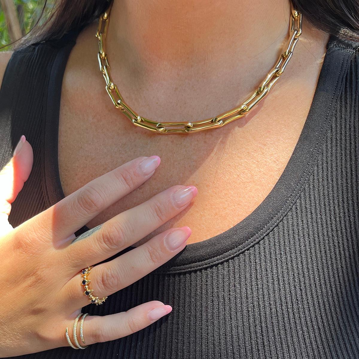 14k yellow gold bamboo chain link necklace.

Measurements: Each link measures 22mm wide., 16